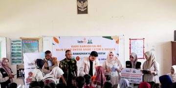 Pemuda Muhammadiyah dan Lazismu Pidie Belikan Baju Baru Untuk 101 Anak Yatim dan Dhuafa